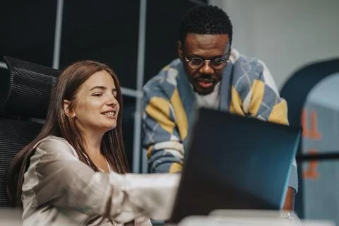 Executives collaborate with cross-generational engineers, planning for profit Stock Photos