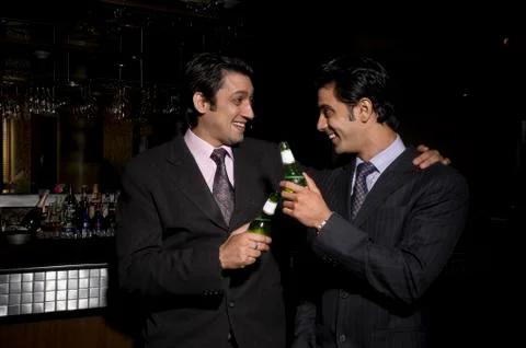 Executives enjoying Stock Photos