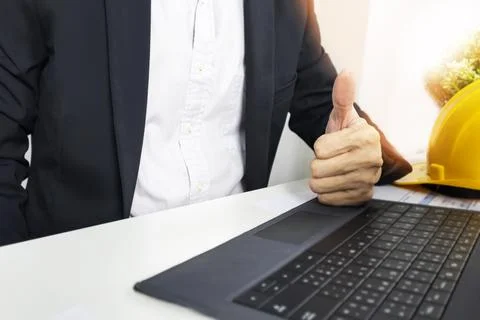 Executives give a thumbs up to show appreciation and encouragement for thei.. Stock Photos