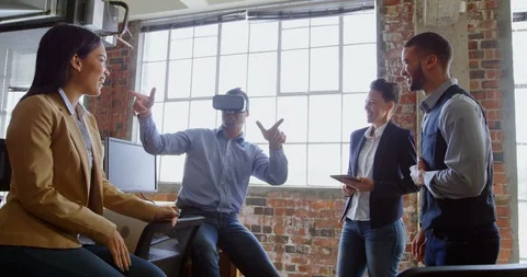 Executives having fun in office 4k Stock Footage 95330442