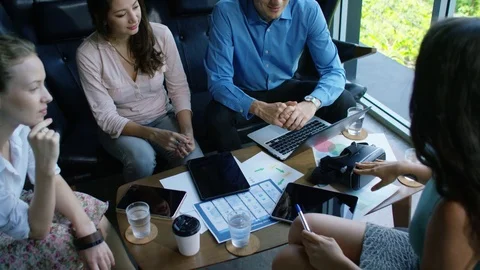 Executives having meeting in office Stock Footage 75452949