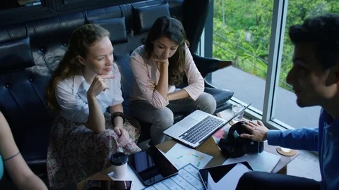 Executives having meeting in office Stock Footage 75453169