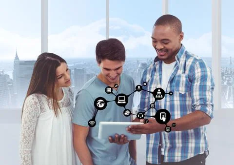 Executives using digital tablet against with connecting icons Stock Photos