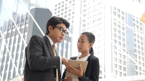 Executives Using Digital Tablet Video stock 87002600