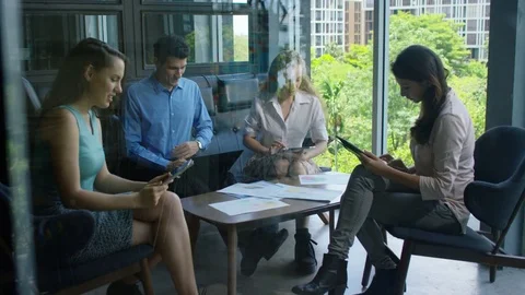 Executives working together in office 스톡 동영상 75451738