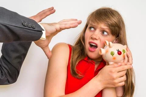 Executor wants to take the last money from piggy bank - confiscation of savin Stock Photos