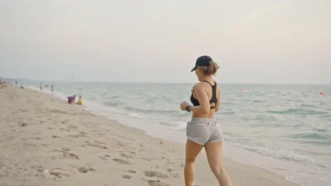 Exercise On Beach Stock Footage 147902591