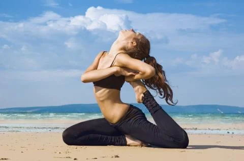 Exercise on the beach. Stock Photos