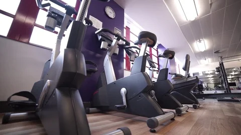Exercise Bikes in Purple Gym Video stock 80019704