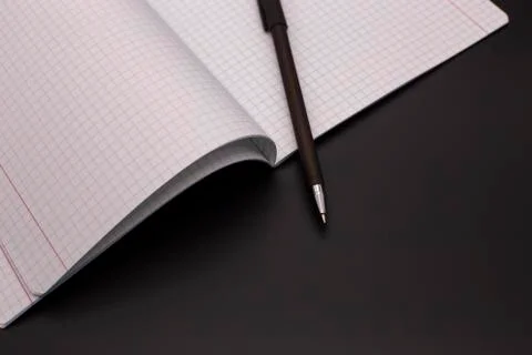 Exercise book on a dark background Fotos de archivo