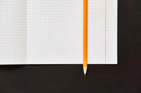 Exercise book with pencil. Stock Photos