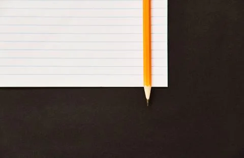 Exercise book with pencil. Stock Photos