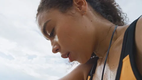 Exercise, break and woman sweating outdoor with breathing, training and thinking Stock Footage 331339249