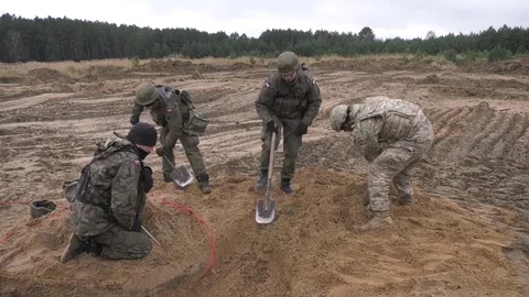 Exercise Bull Eagle - hole being dug for explosives during exercise in Poland 스톡 동영상 82862873