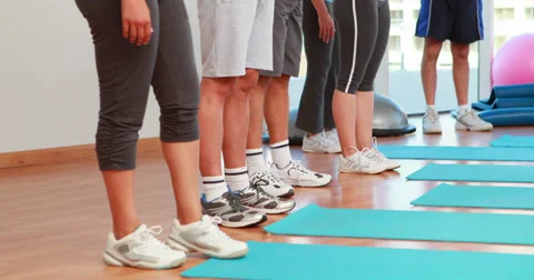 Exercise class doing a plank Video stock 34262715