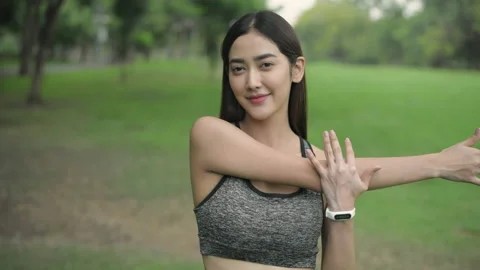 Exercise concept of 4k Resolution. Athletes are stretching muscles in the pub Stock Footage 205025902