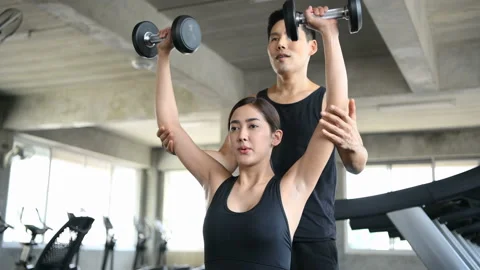 Exercise concepts. Young women practicing exercise in the gym. 4k Resolution. Stock Footage 135540628