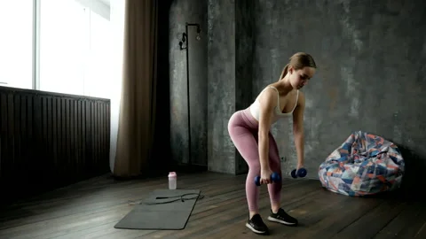 Exercise with dumbbells Stock Footage 170235438