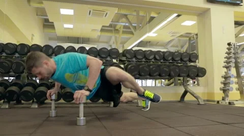 Exercise with dumbbells in the gym Stock Footage 47861948