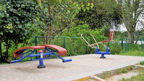 Exercise equipment in Agara lake for senior citizens.Well maintained lake f.. Stock Photos