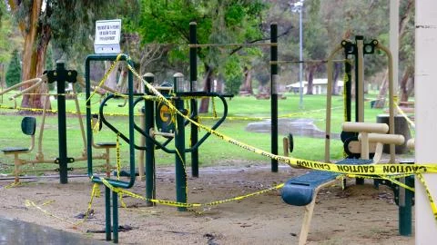 Exercise Equipment with Caution Tape Foto stock