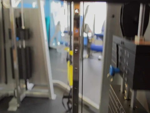 Exercise equipment: loads moving up and down. dolly shot Stock Footage 74236452