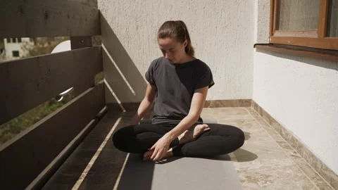Exercise failure concept at home. Beginner athlete woman learning yoga asanas Stock Footage 131223277