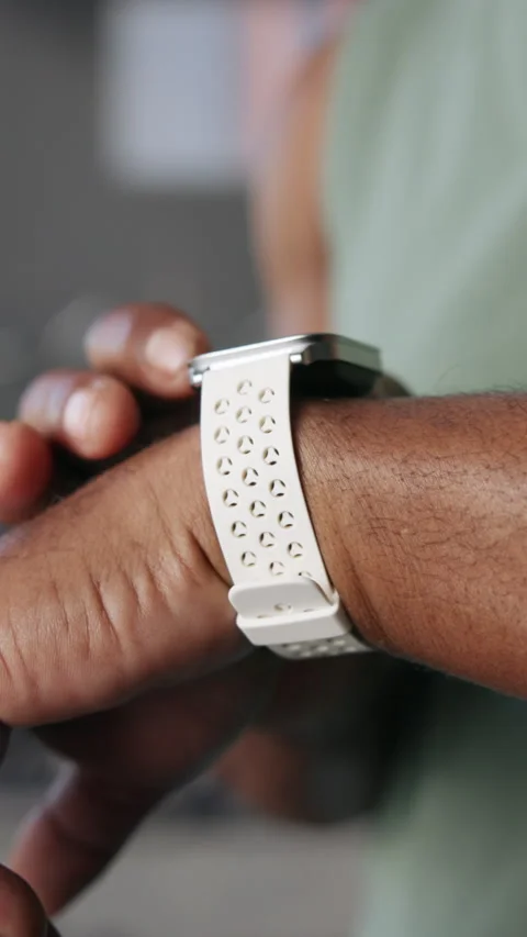 Exercise, hands and smart watch with man in gym for performance, progress on Stock Footage 333665923