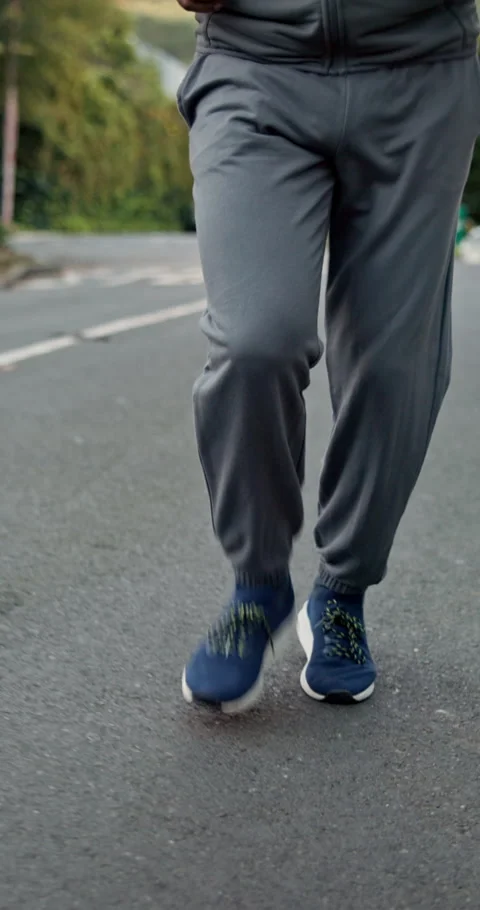Exercise, headphones and running with black man outdoor on street for cardio Stock Footage 340968213