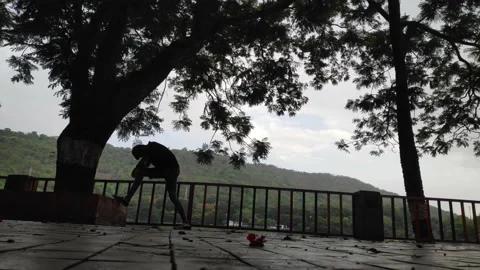 Exercise in the morning time against the sun Stock Footage 132275286