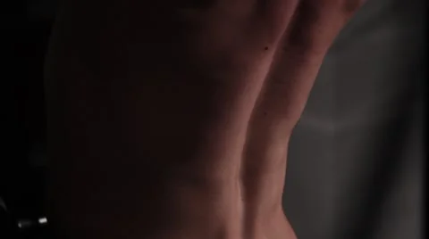 Exercise for pumping back muscles. athlete trains at the gym on a simulator 스톡 동영상 62758976