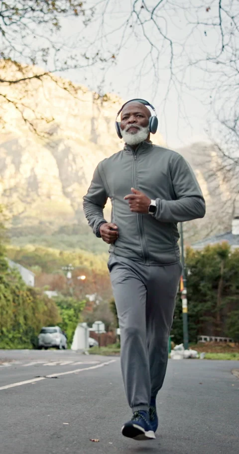 Exercise, running and old man with headphones outdoor to listen to radio, cardio Stock Footage 340966655