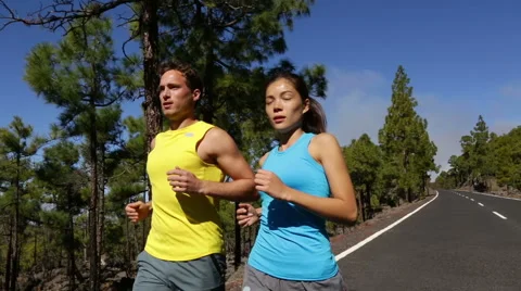 Exercise running sport - runners training on road for marathon Stock Footage 46182516