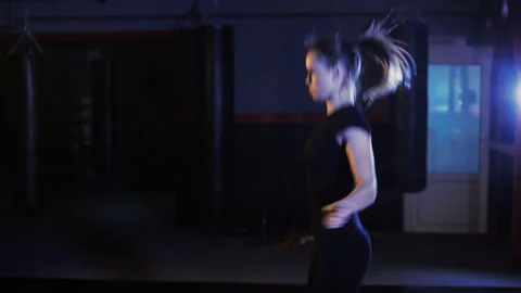 Exercise with a skipping rope in the gym Stock Footage 87068073