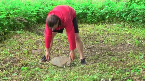 Exercise with a stone Vídeo Stock 11359132