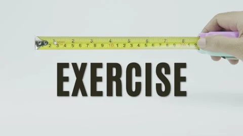 Exercise text or word and tape measure on a white background Stock Footage 302062396