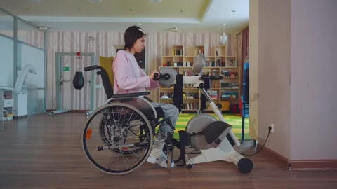 Exercise therapy on an exercise bike Видео 331077110