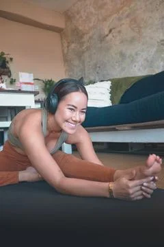 Exercise will greatly transform your life. a young woman stretching her legs Stock Photos