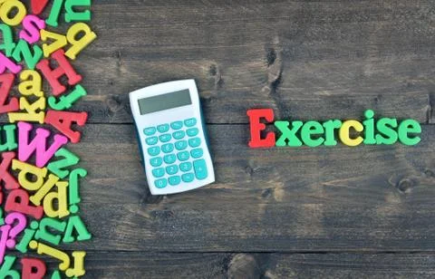 Exercise on wooden table 库存照片