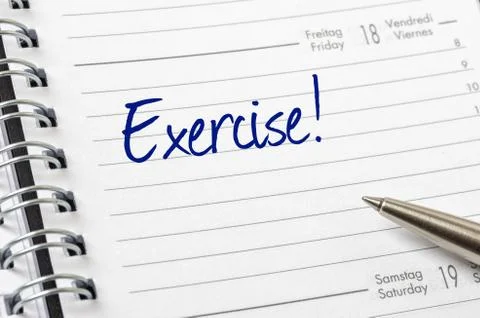 Exercise written on a calendar page 库存照片