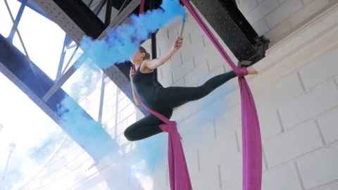 Exercises with aerial silk Stock Footage 95176760
