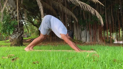 Exercises for better mobility in the morning in summer time on canary islands. Video stock 247451805