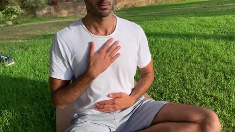 Exercises for better mobility in the morning in summer time on canary islands. Video stock 247451852