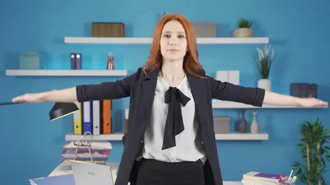 Exercises that can be done in the office. Business woman doing standing exercise Vídeos de archivo 232180895