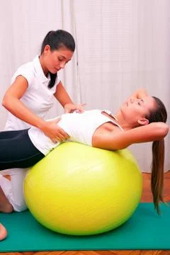Exercises control basin trunk with bobath ball fitball stabilization exercise Stock Photos