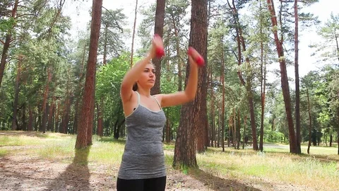 Exercises with dumbbells 動画素材 78234086