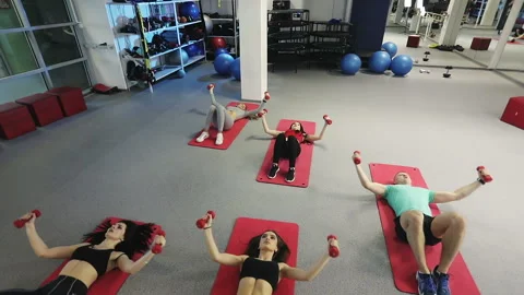 Exercises with dumbbells. Stock Footage 89836002