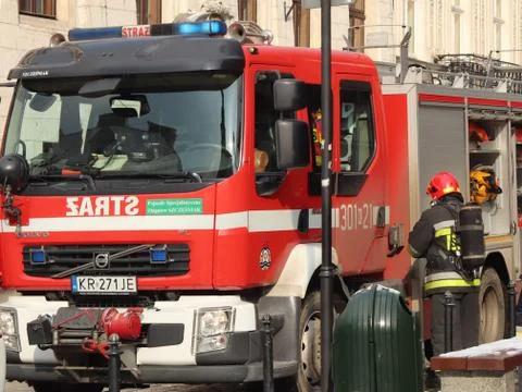 Exercises fire brigade in the old part of the city in the winter. Stock Photos