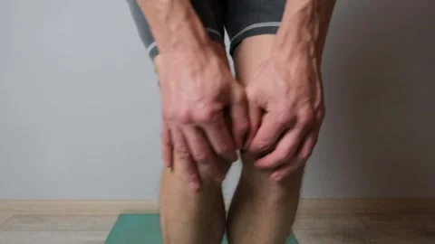 Exercises for knee joints. Close up of legs performing rehabilitation and Video stock 316061369