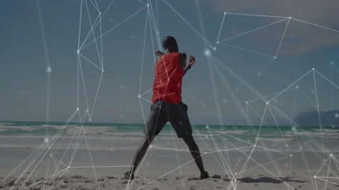 Exercising on beach, person with digital network animation overlay in background Stock Footage 305121240